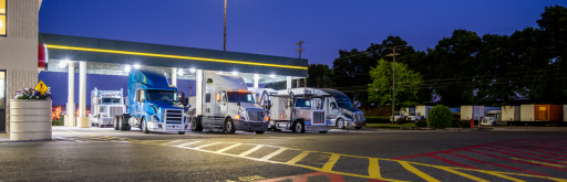 Trucks at rest stop ready for cross border less than truckload shipping